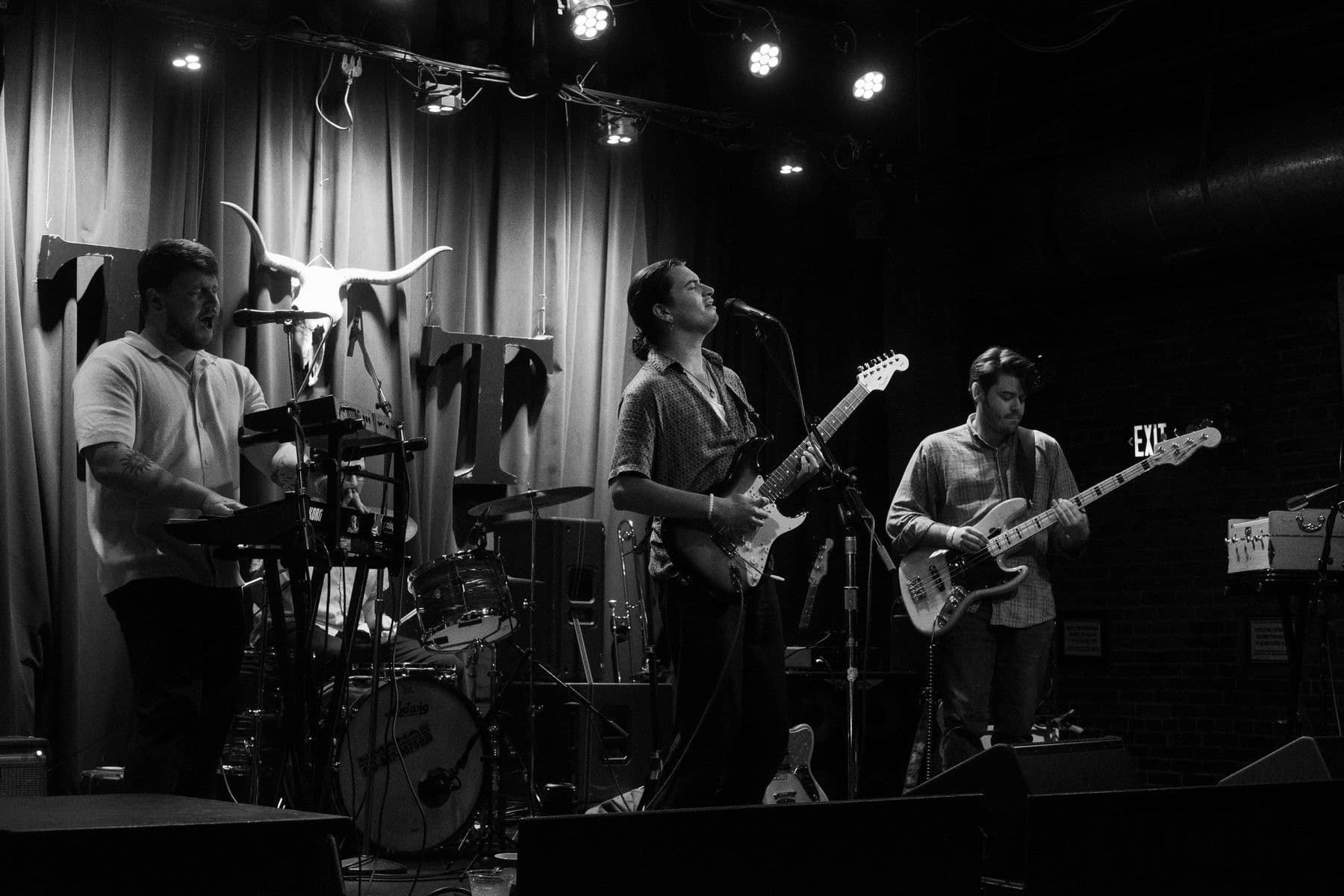 Burgundy Suns on stage at the Tractor Tavern, black and white
